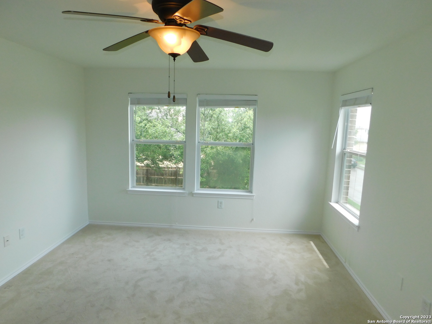 4302 Crystal Bay San Antonio, TX 78259 - Photo 18 of 32 a view of an empty room with a window