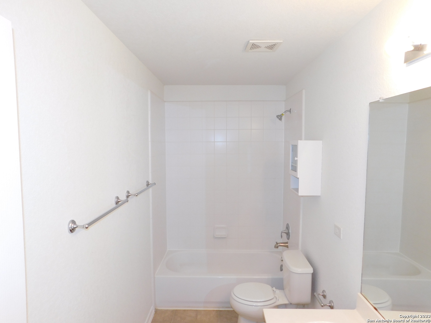 4302 Crystal Bay San Antonio, TX 78259 - Photo 27 of 32 a bathroom with a granite countertop bathtub shower and toilet
