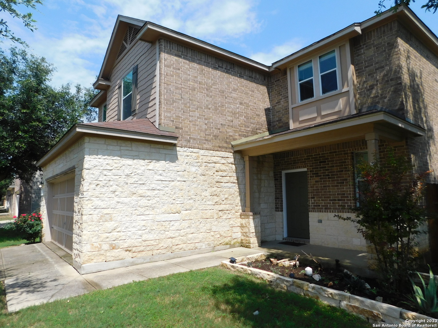 4302 Crystal Bay San Antonio, TX 78259 - Photo 3 of 32 a front view of a house with a yard
