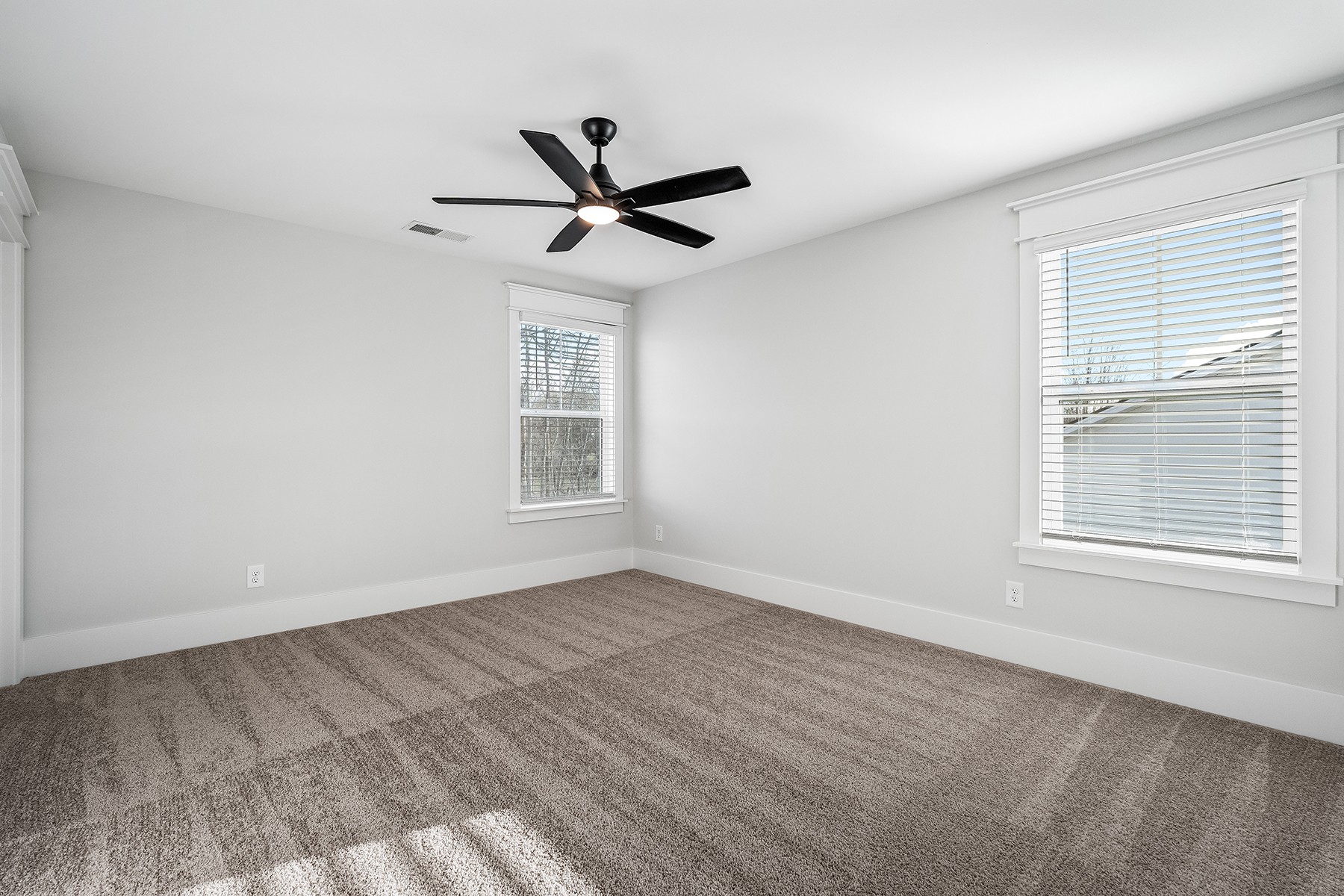 617 Silver Trace White House, TN 37188 - Photo 13 of 19 a view of empty room with wooden floor and fan