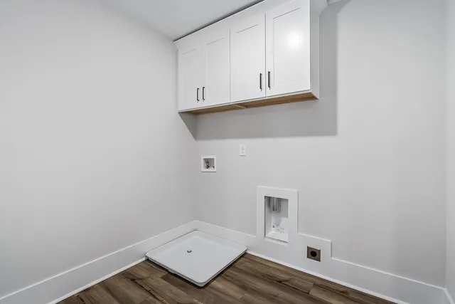 an empty room with cabinet