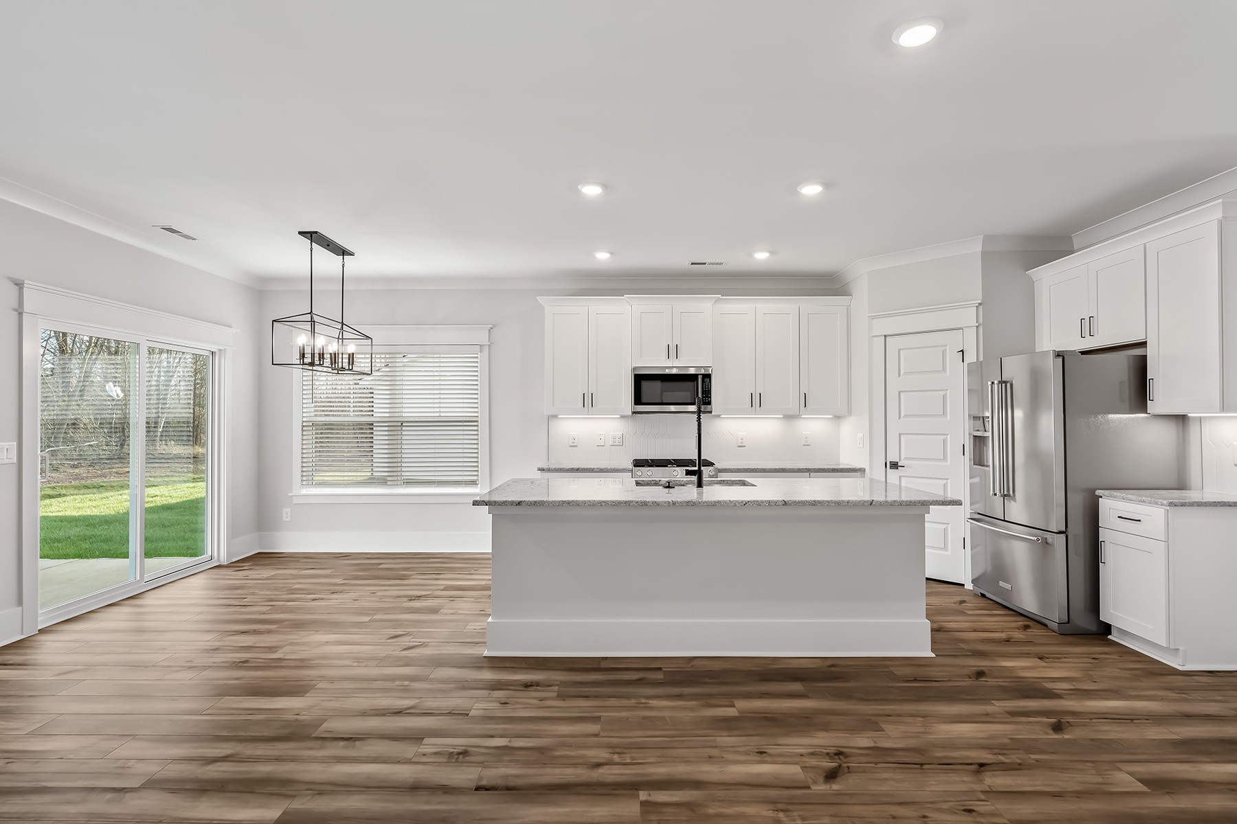 617 Silver Trace White House, TN 37188 - Photo 5 of 19 a view of kitchen with stainless steel appliances granite countertop a stove top oven a refrigerator a sink and a large window