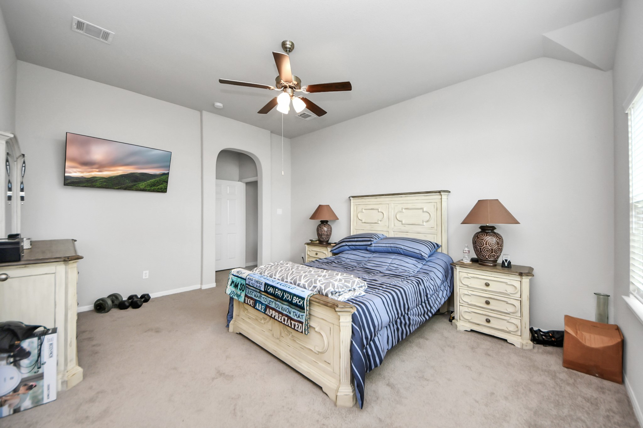 1654 Sequoia Run Drive Rosharon, TX 77583 - Photo 13 of 24 a bedroom with a bed and a chandelier