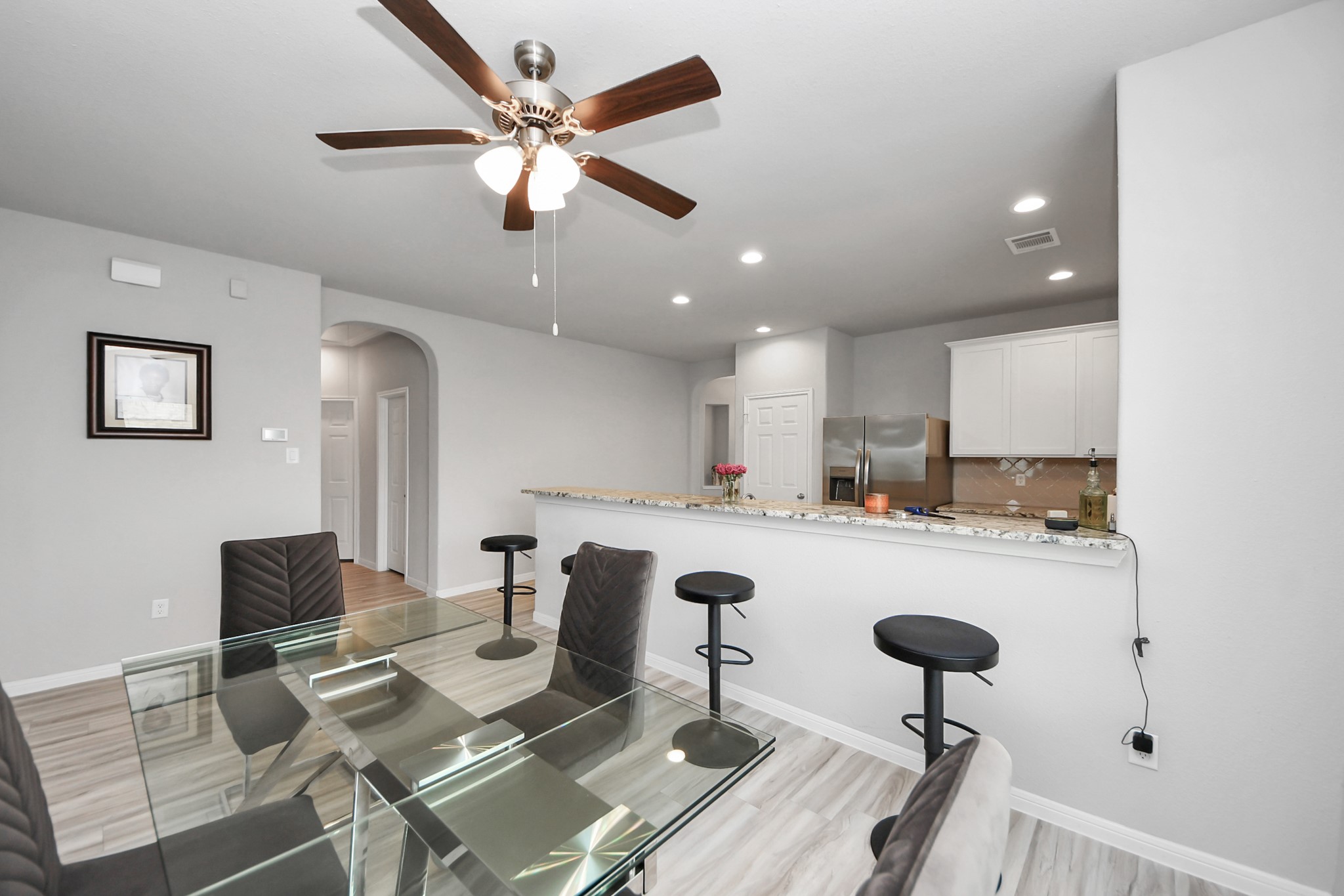 1654 Sequoia Run Drive Rosharon, TX 77583 - Photo 9 of 24 a kitchen with a table and chairs