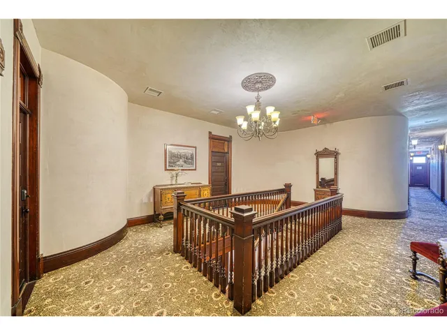 a view of a livingroom with furniture and window