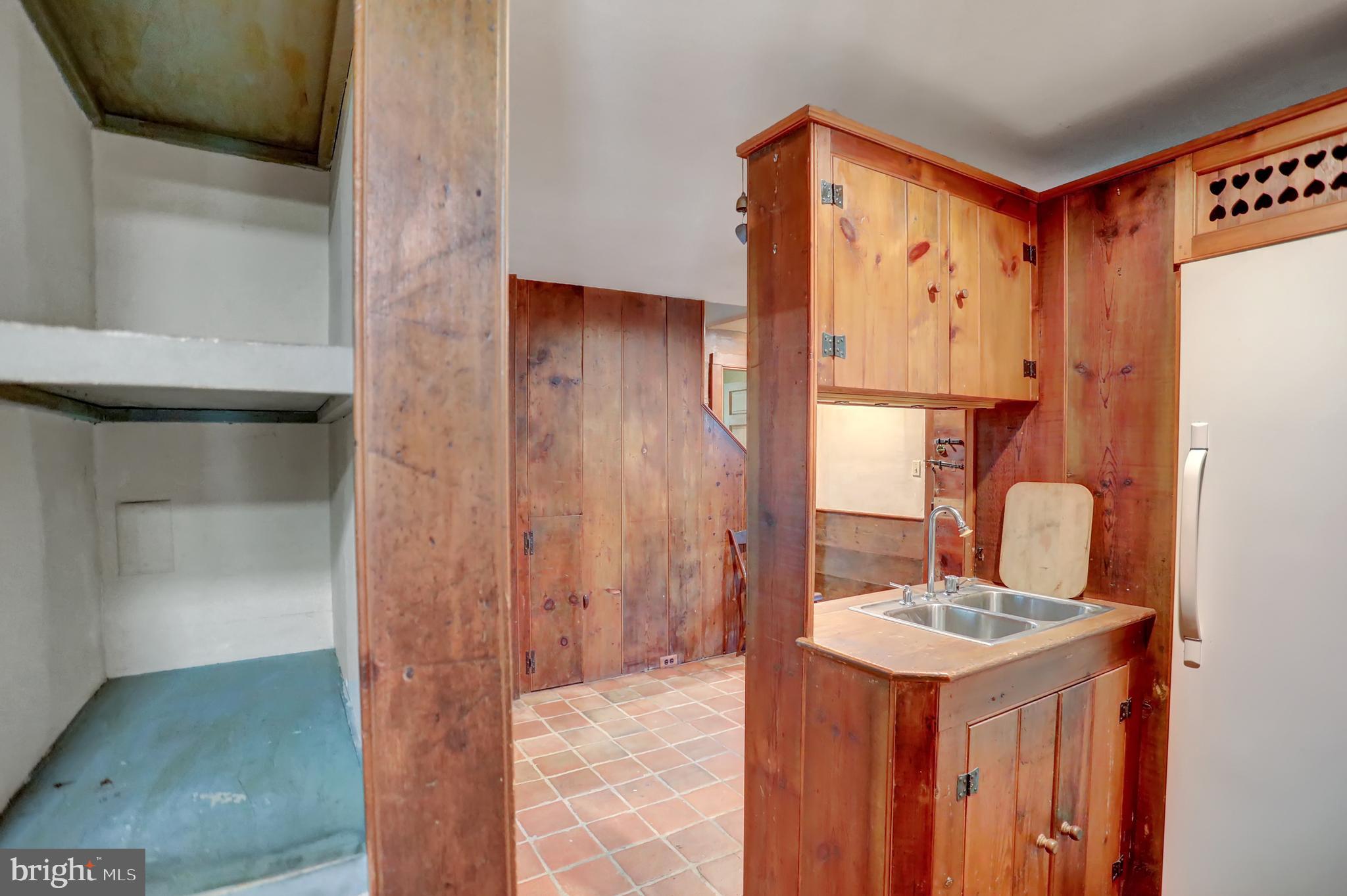 10909 Garrison Forest Road Owings Mills, MD 21117 - Photo 20 of 59 Mudroom wet bar off kitchen
