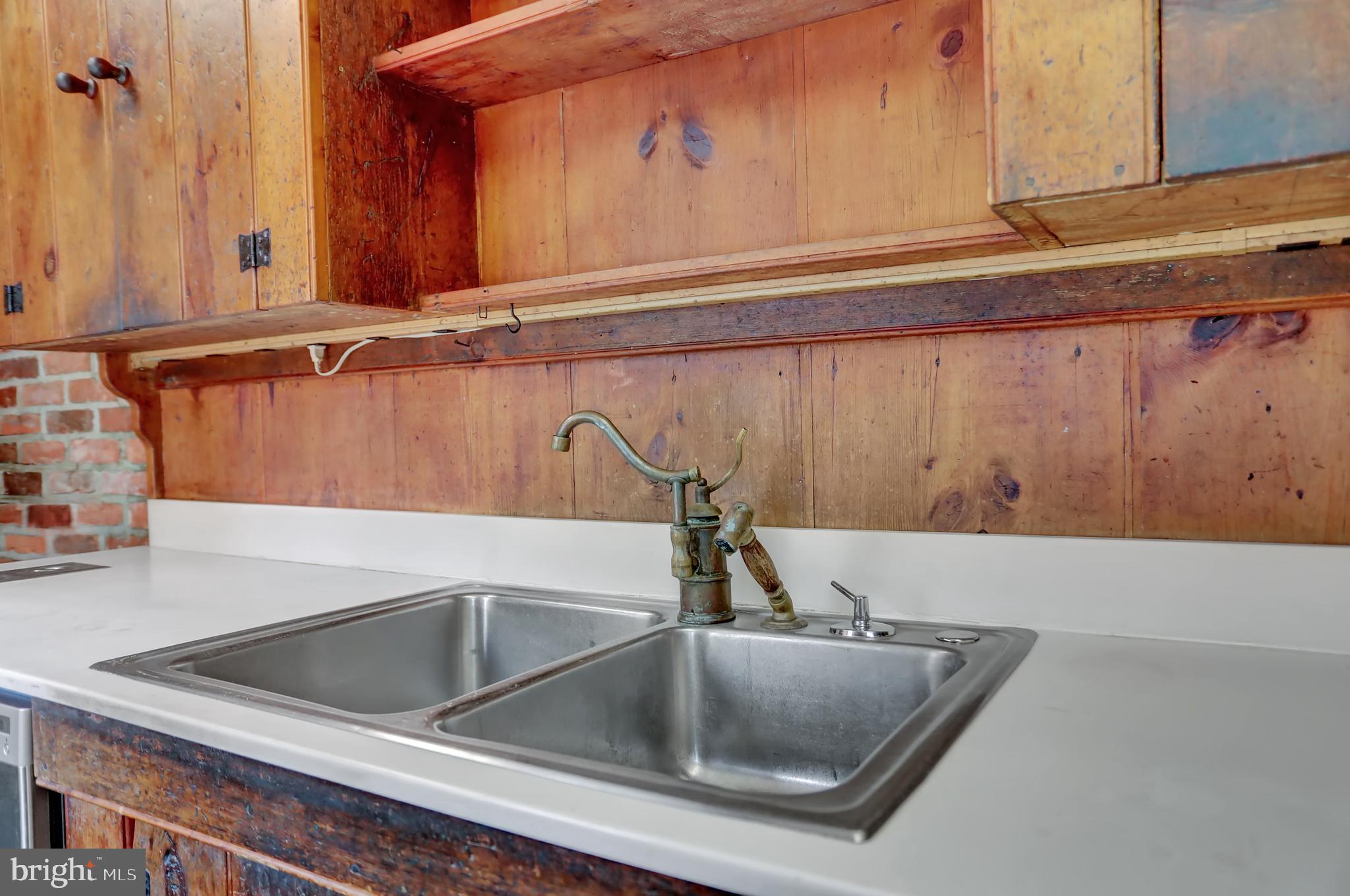 10909 Garrison Forest Road Owings Mills, MD 21117 - Photo 23 of 59 Detail of antique kitchen faucet
