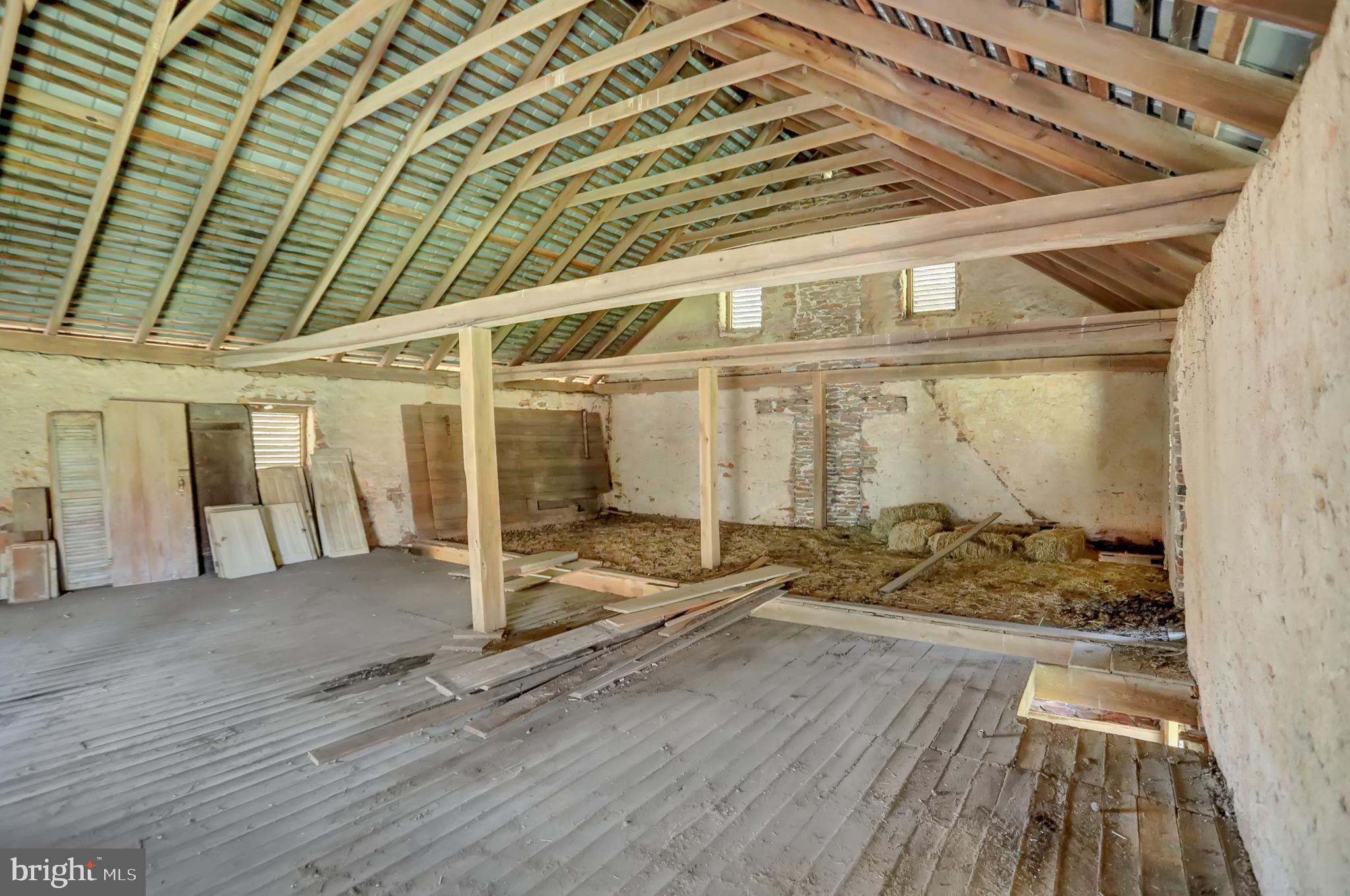 10909 Garrison Forest Road Owings Mills, MD 21117 - Photo 45 of 59 Barn hayloft over the stalls