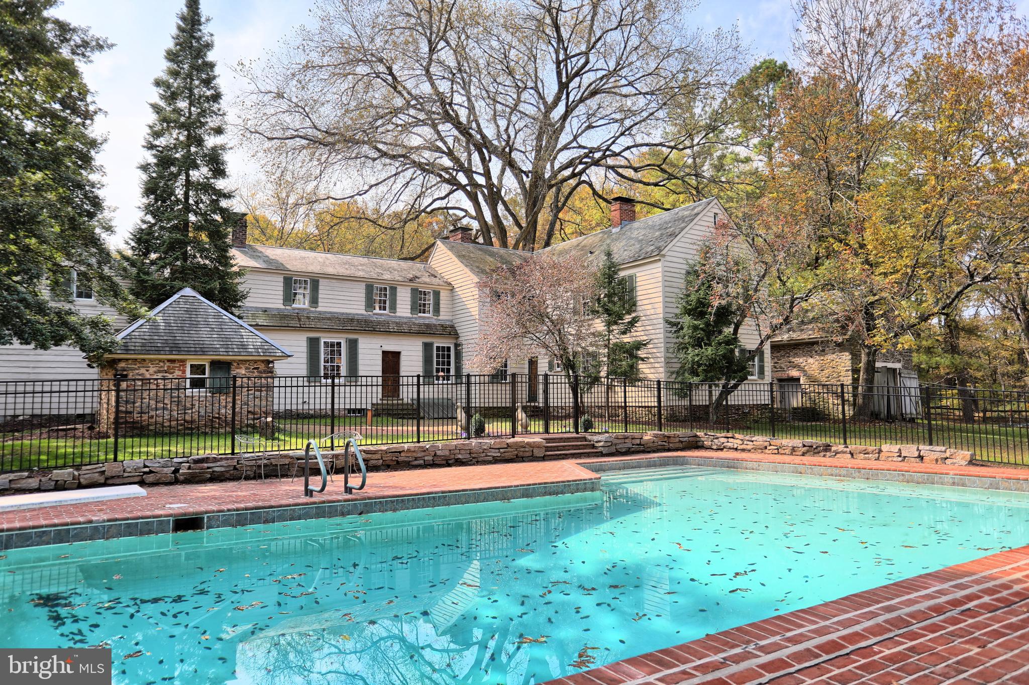 Rear view of house and pool