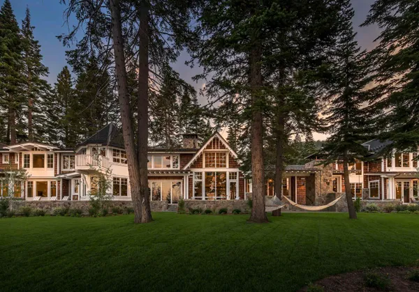 a view of house with yard and green space