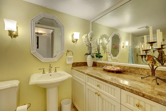 a bedroom with a bed dresser and a window