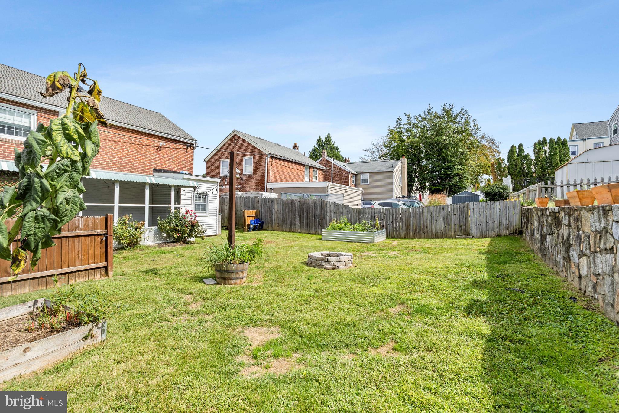 30 Wayne Avenue Springfield, PA 19064 - Photo 23 of 24 a swimming pool with outdoor seating and yard