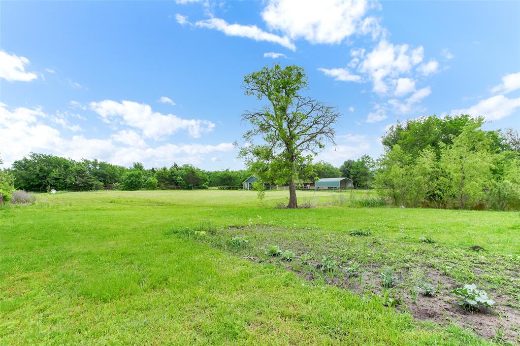 7634 Preston Road Denison, TX 75020 - Photo 32 of 34 a view of field with green space