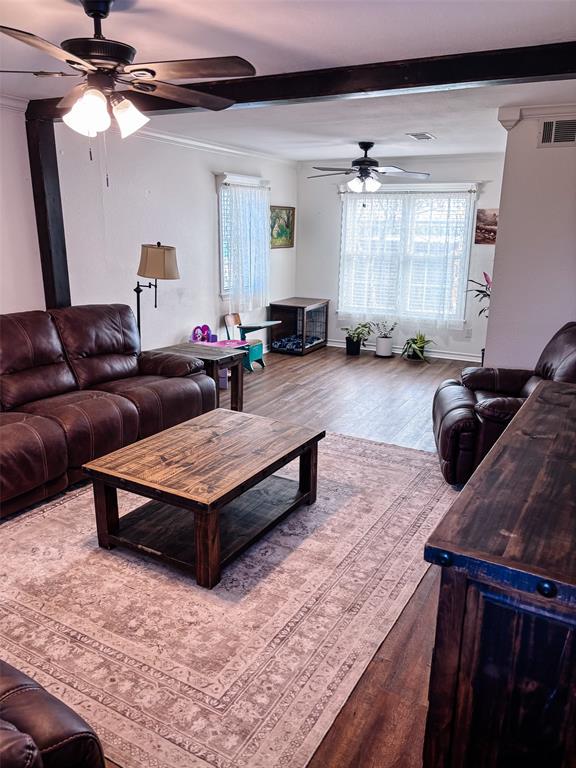 7634 Preston Road Denison, TX 75020 - Photo 10 of 34 a living room with furniture and a window