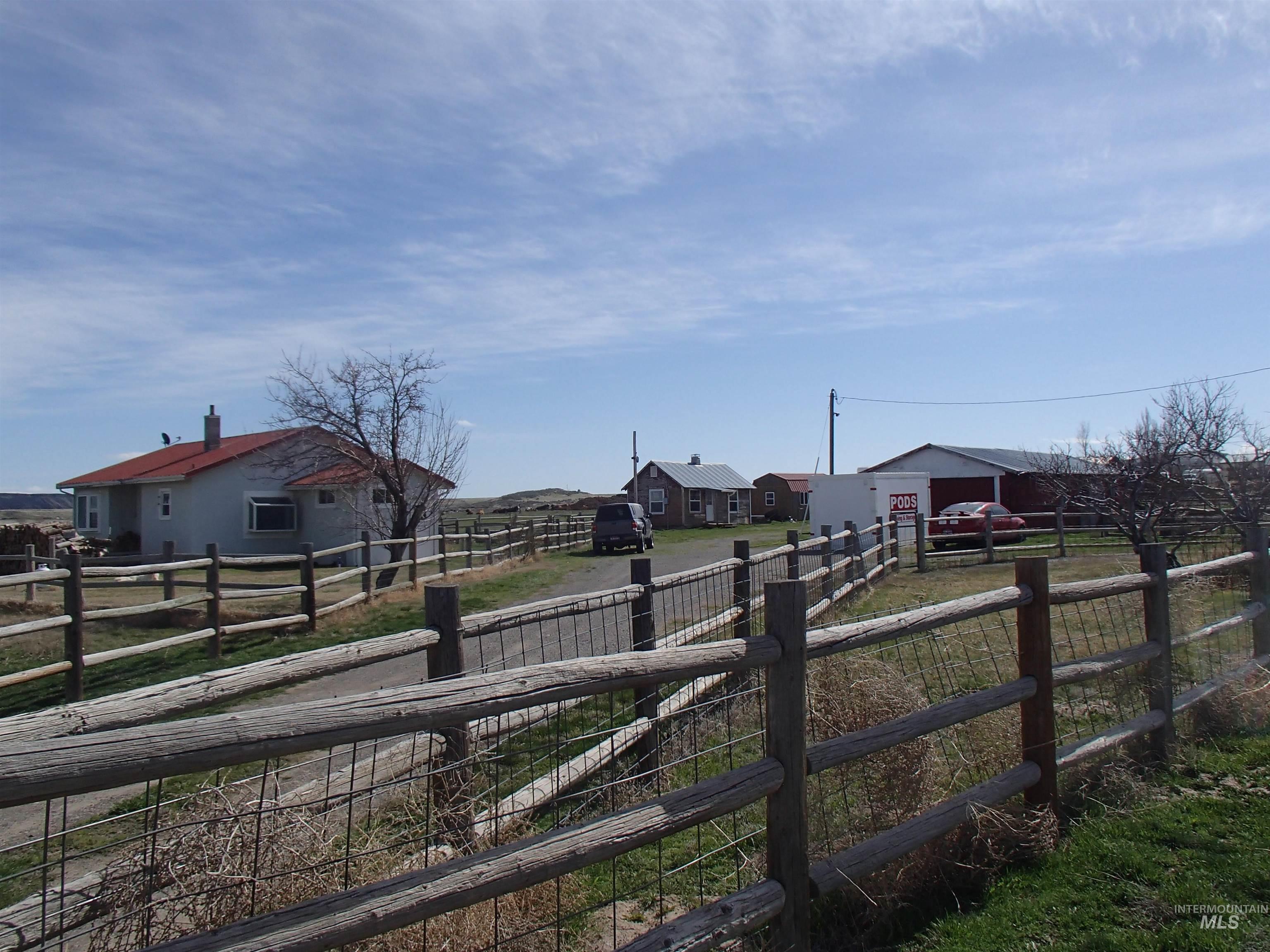 View of yard featuring an outbuilding and a rural view