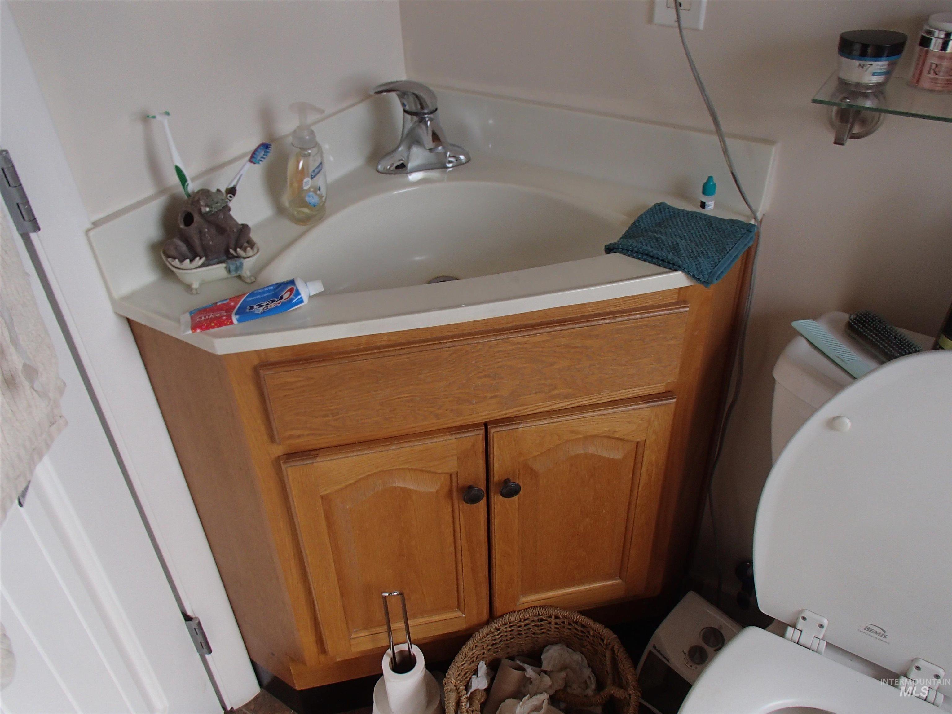 9506 Wright Road Melba, ID 83641 - Photo 12 of 37 Bathroom featuring toilet and vanity