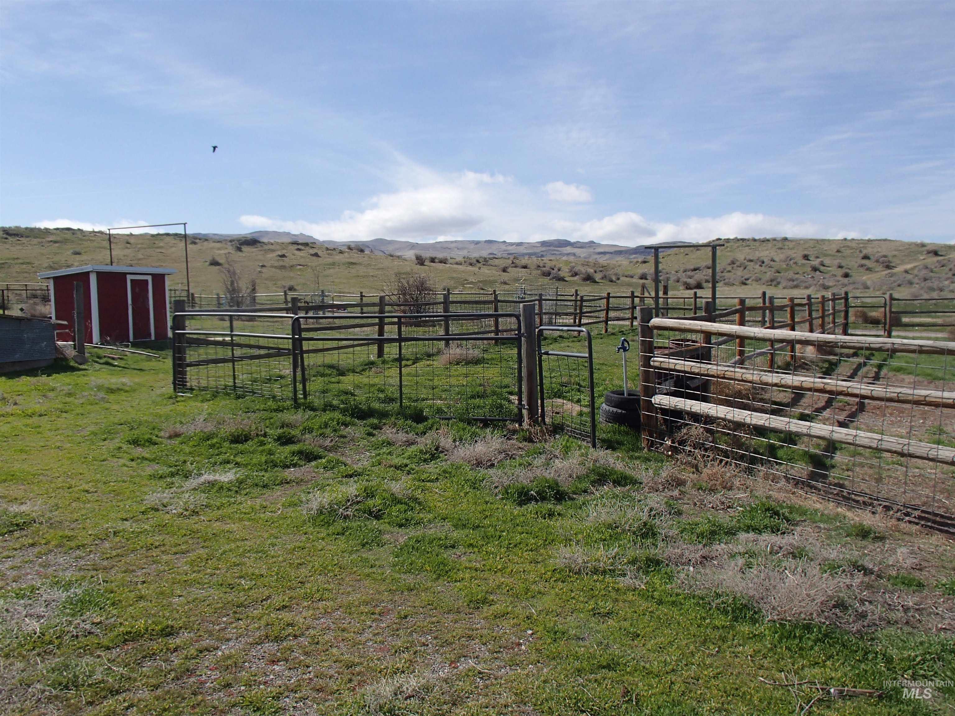 9506 Wright Road Melba, ID 83641 - Photo 33 of 37 View of yard with a mountain view, a rural view, and a shed