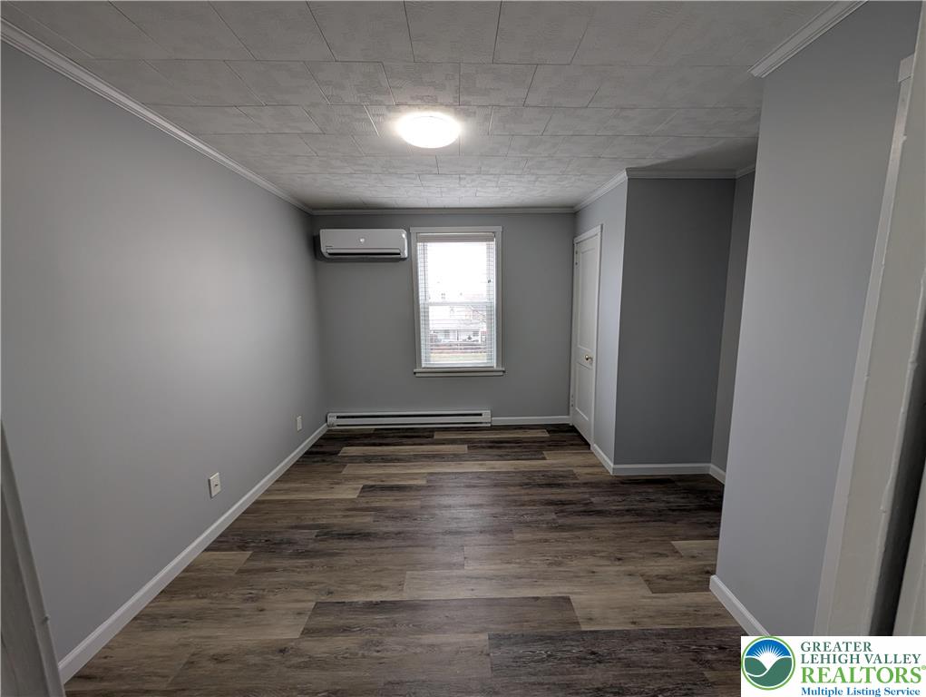 1111 Catasauqua Road, Unit 2 Whitehall, PA 18052 - Photo 4 of 9 a view of empty room with window