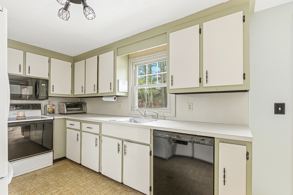 10 Wapping Road Kingston, MA 02364 - Photo 4 of 21 a kitchen with a sink cabinets and window