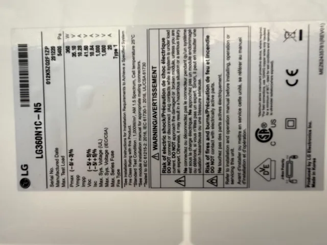 a wooden bench sitting in the middle of a snow