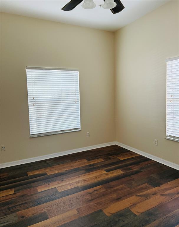 970 North Spring Garden Avenue, Unit 311 DeLand, FL 32720 - Photo 11 of 16 a view of a small space with wooden floor and a window