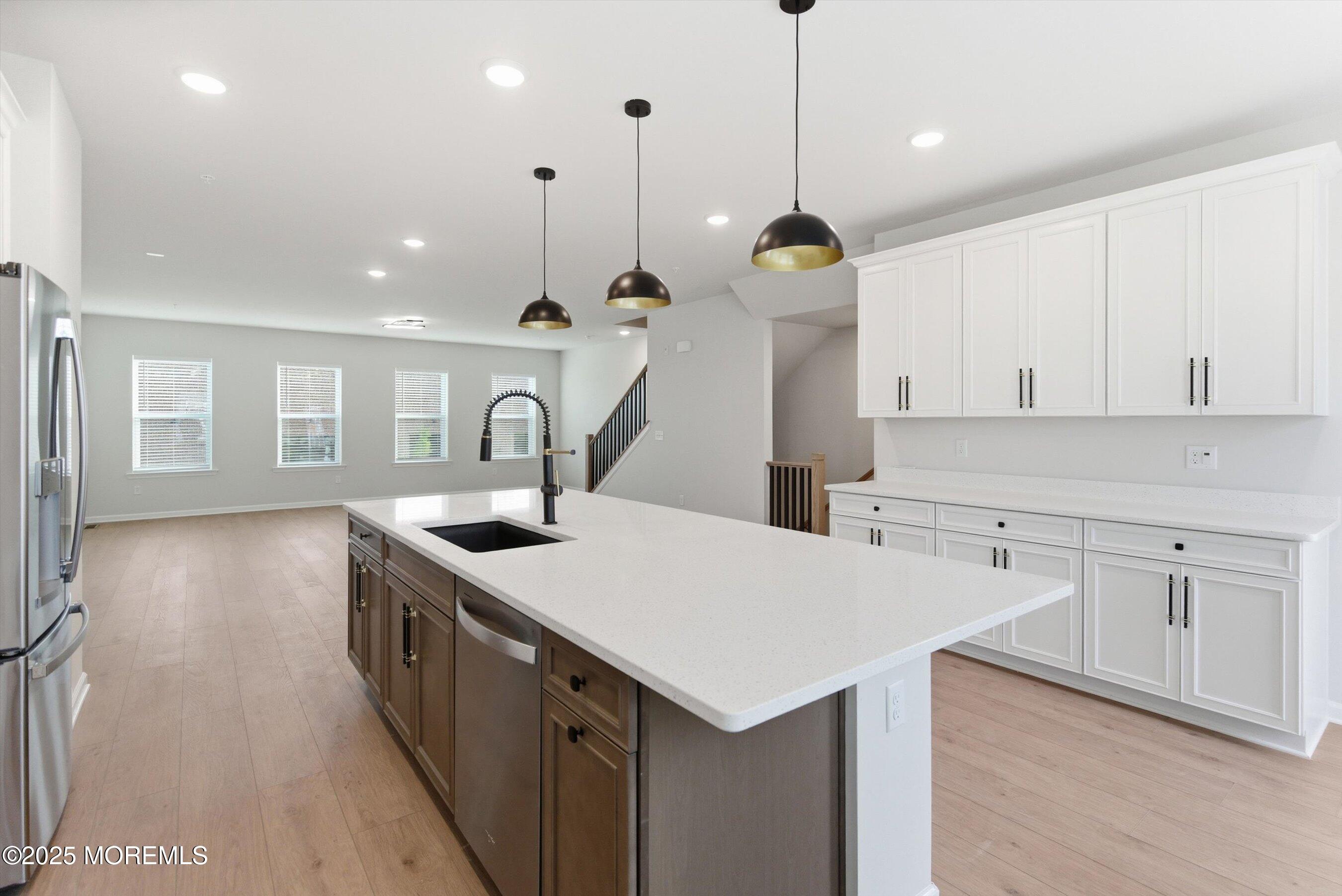 4 Barton Avenue Oceanport, NJ 07757 - Photo 13 of 47 a kitchen that has a lot of cabinets in it