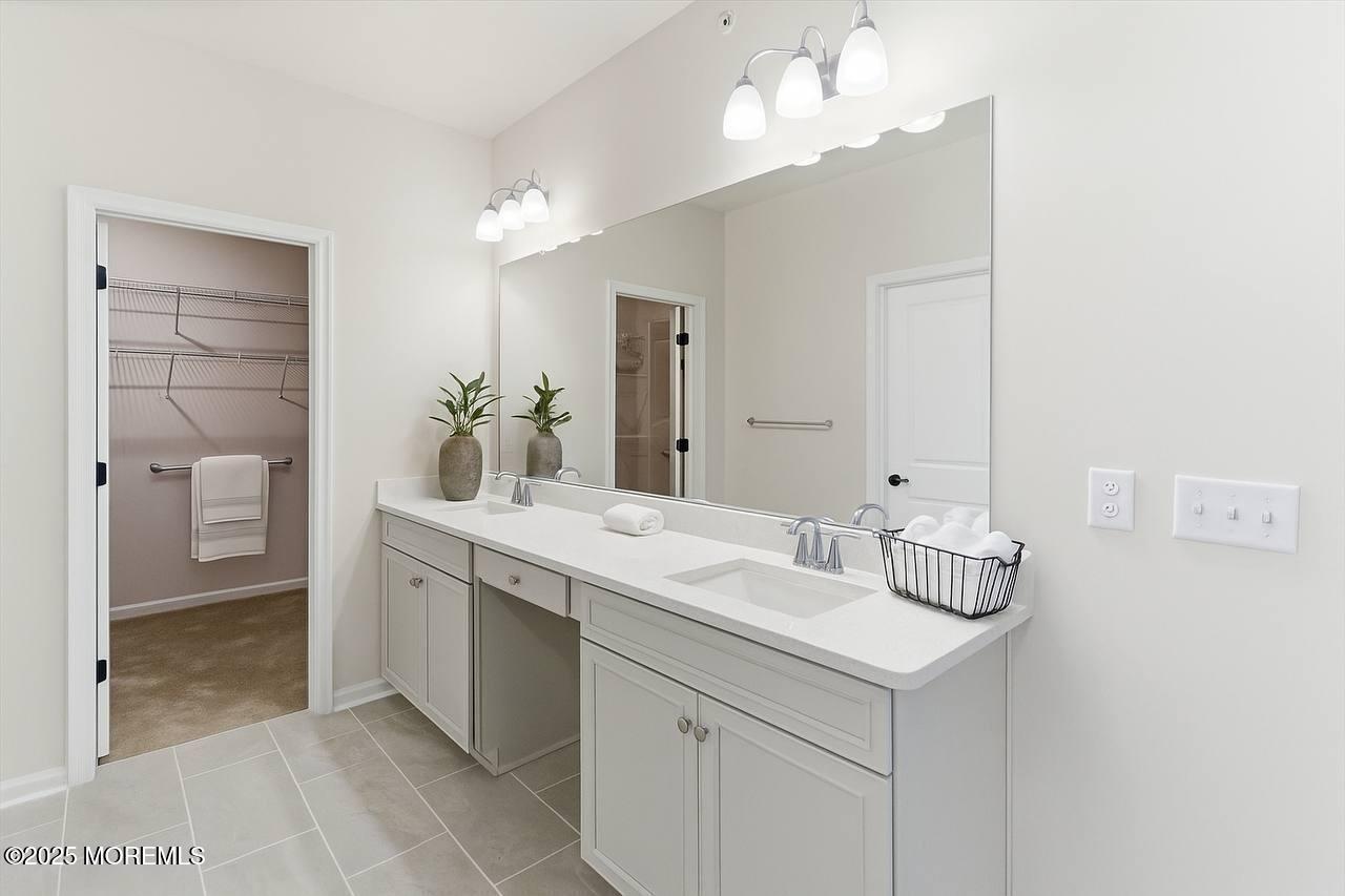 4 Barton Avenue Oceanport, NJ 07757 - Photo 24 of 47 a bathroom with a sink vanity and a mirror