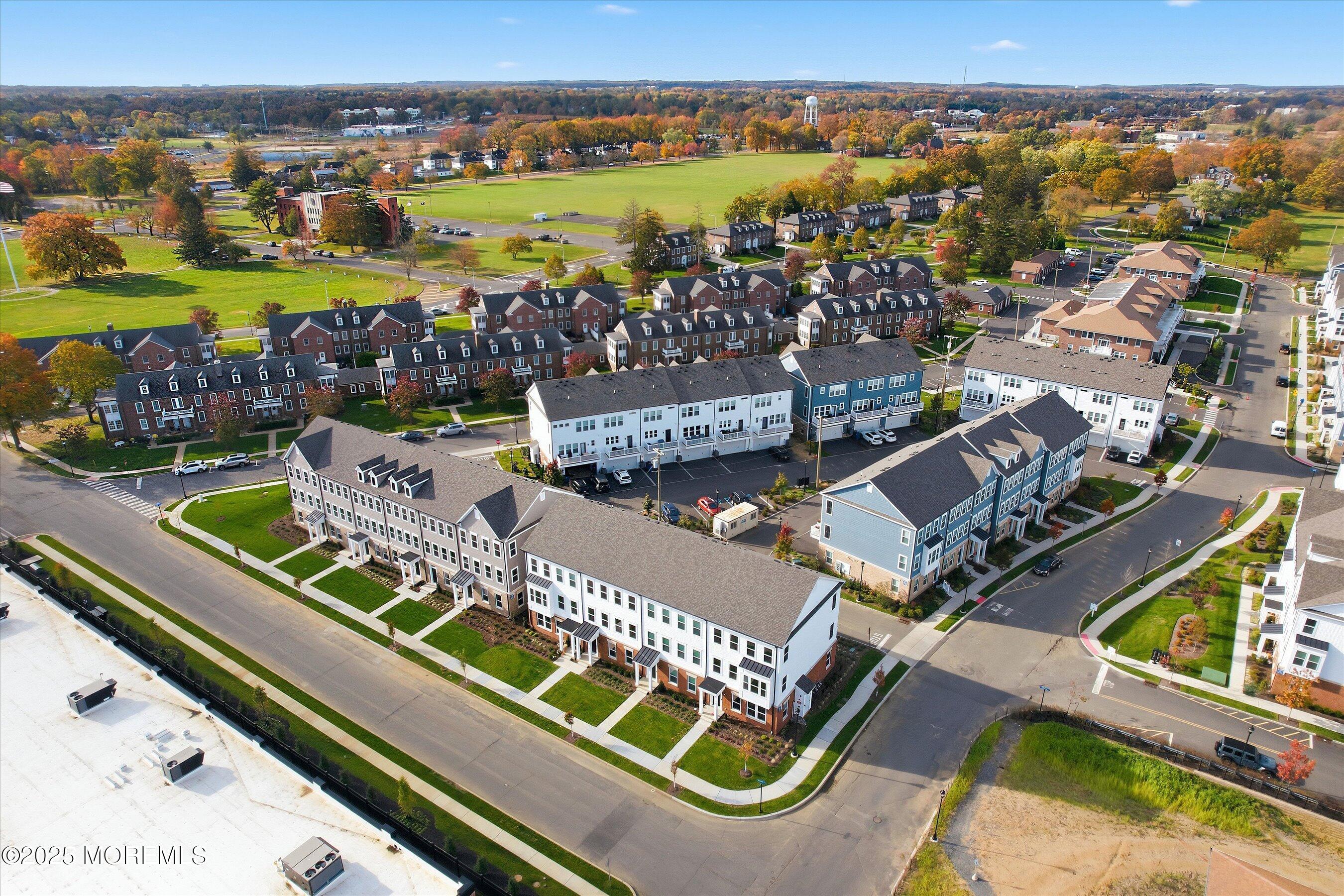 4 Barton Avenue Oceanport, NJ 07757 - Photo 3 of 47 an aerial view of a house with a garden and lake view