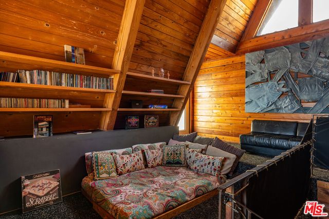 a view of staircase with a rug