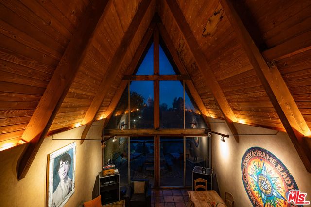 a view of a balcony with table and chairs
