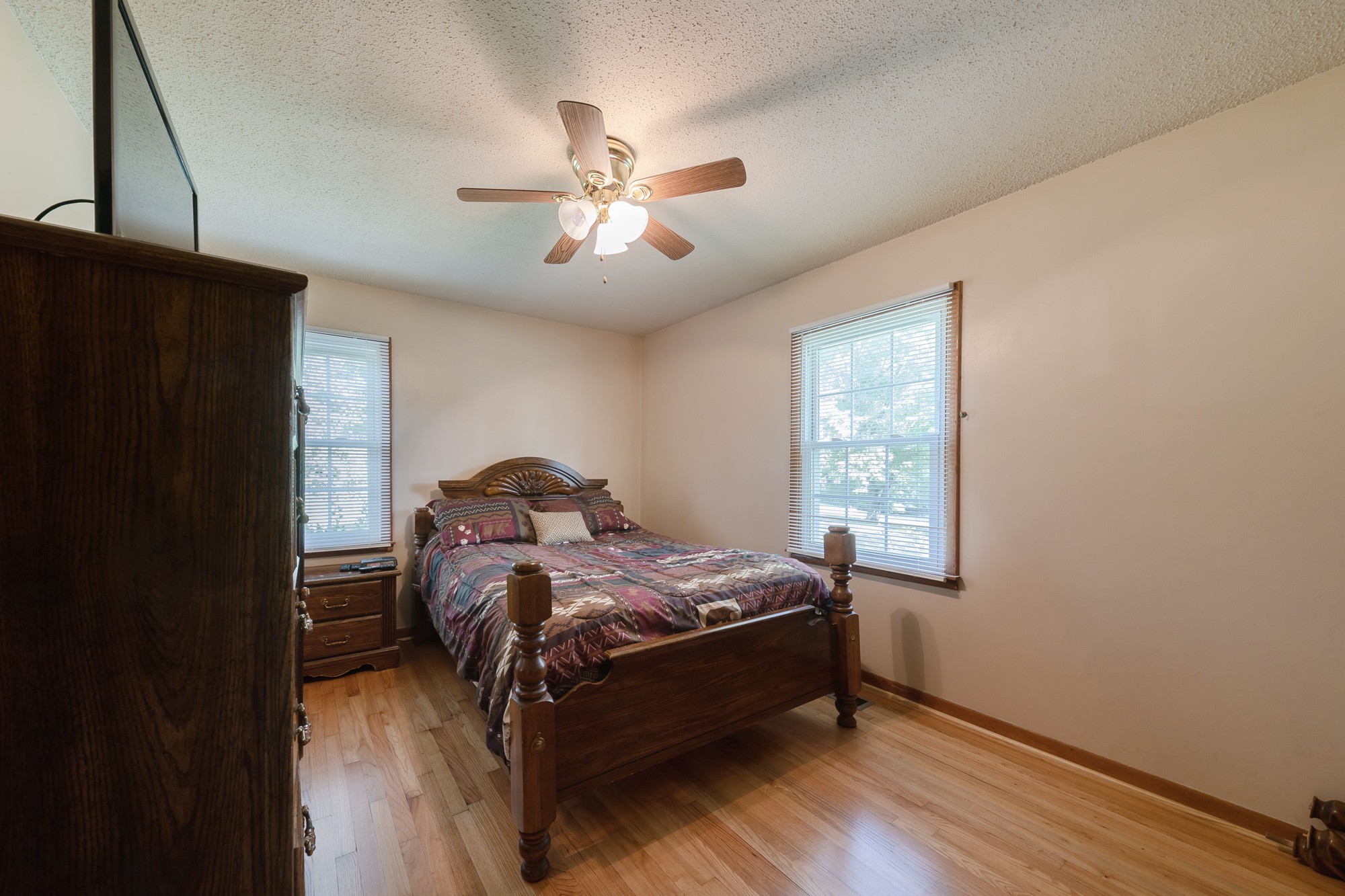 1274 Fall River Road Goodspring, TN 38460 - Photo 11 of 24 a bed sitting in a bedroom next to a window