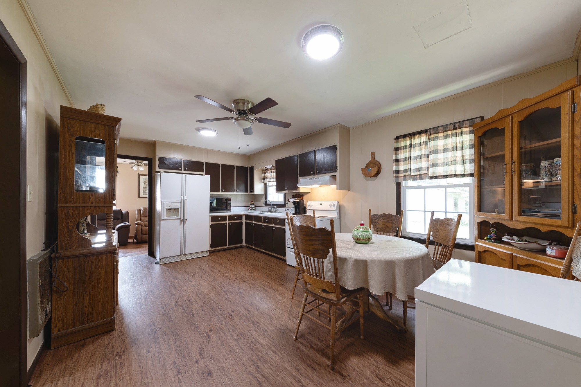 1274 Fall River Road Goodspring, TN 38460 - Photo 7 of 24 a view of a dining room with furniture window and wooden floor