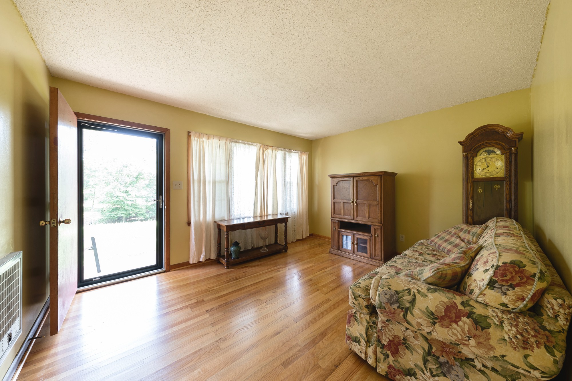 1274 Fall River Road Goodspring, TN 38460 - Photo 8 of 24 a living room with fireplace furniture and a wooden floor