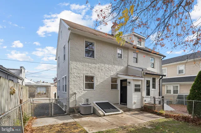 a front view of a house with yard