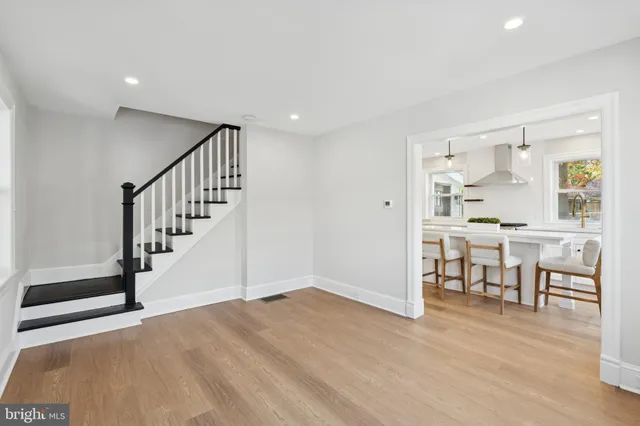 a view of dining room with furniture and wooden floor