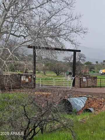 a view of ocean view with large trees