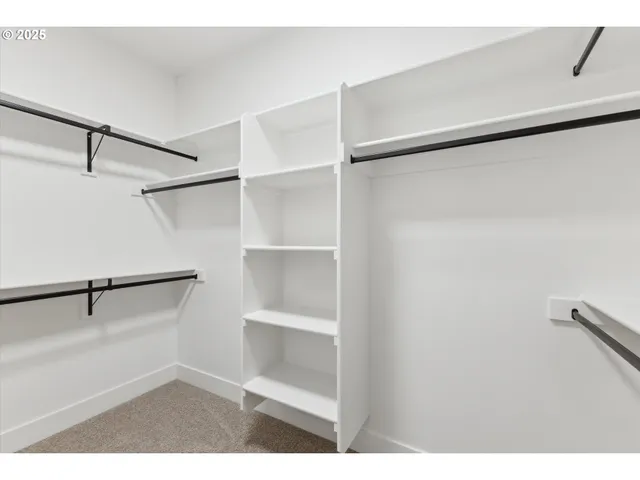 a view of a room with racks on the wall