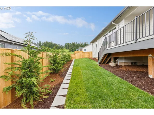 a picture of a bathroom with mirror and shower
