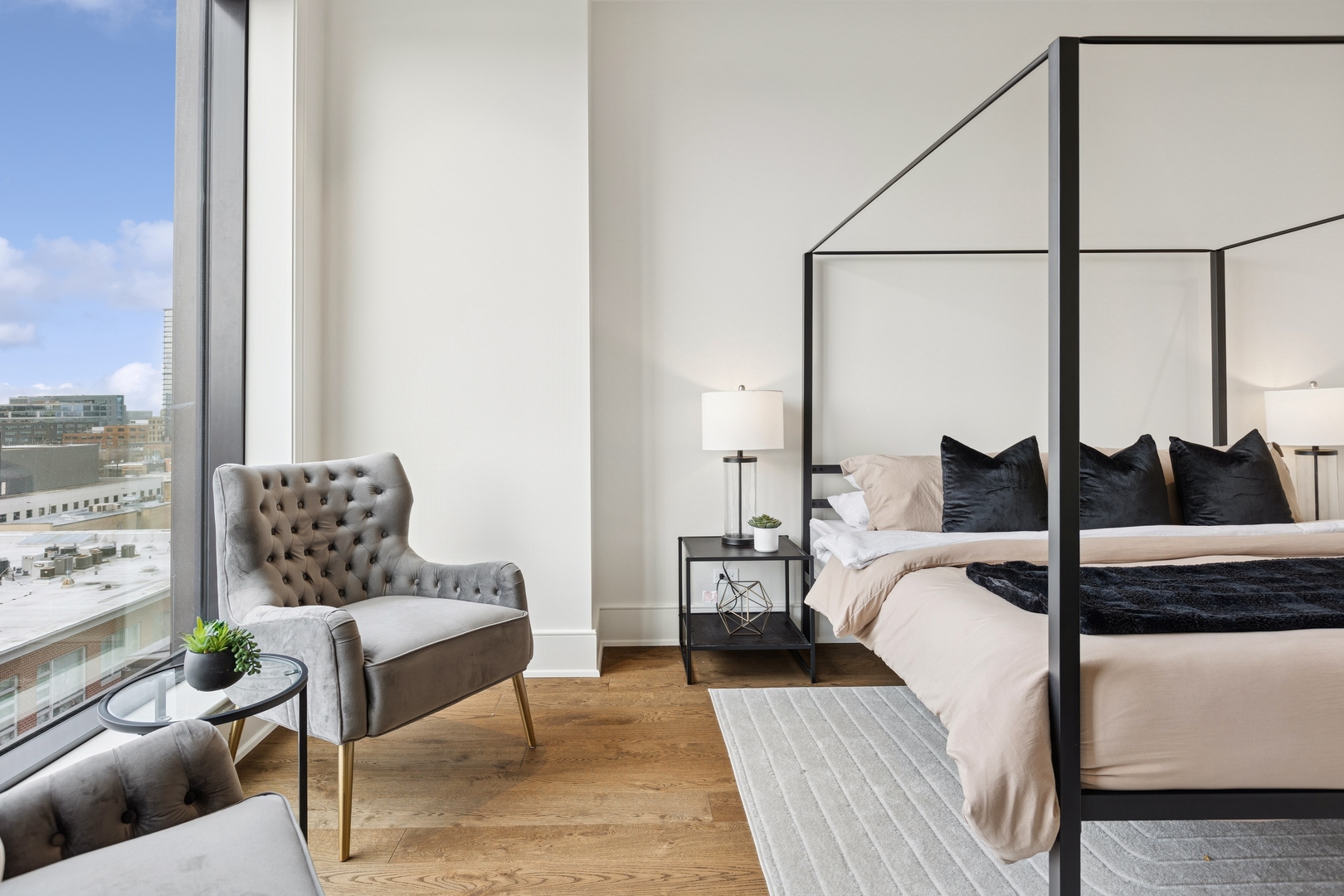 21 North May Street, Unit 703 Chicago, IL 60607 - Photo 32 of 56 a living room with furniture and a large window