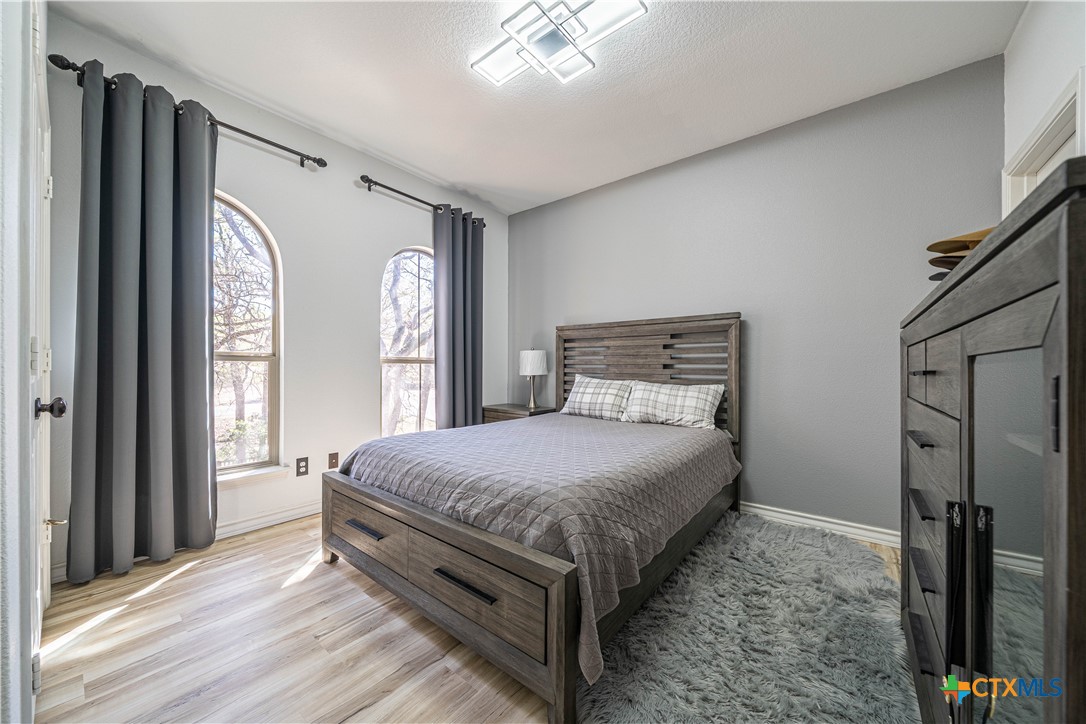 519 Long Meadow Spring Branch, TX 78070 - Photo 22 of 33 a bedroom with bed and window