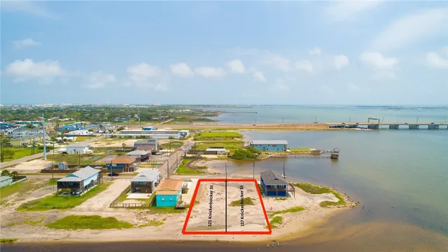 an aerial view of a houses with outdoor space