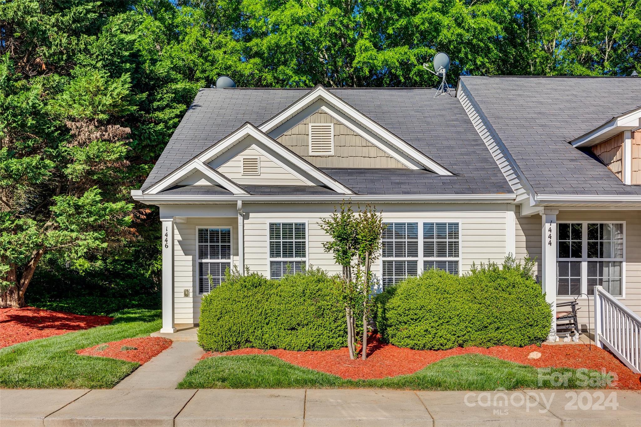 1446 Harpers Inlet Drive Clover, SC 29710 - Photo 1 of 28 a view of a house with a yard plants and large tree