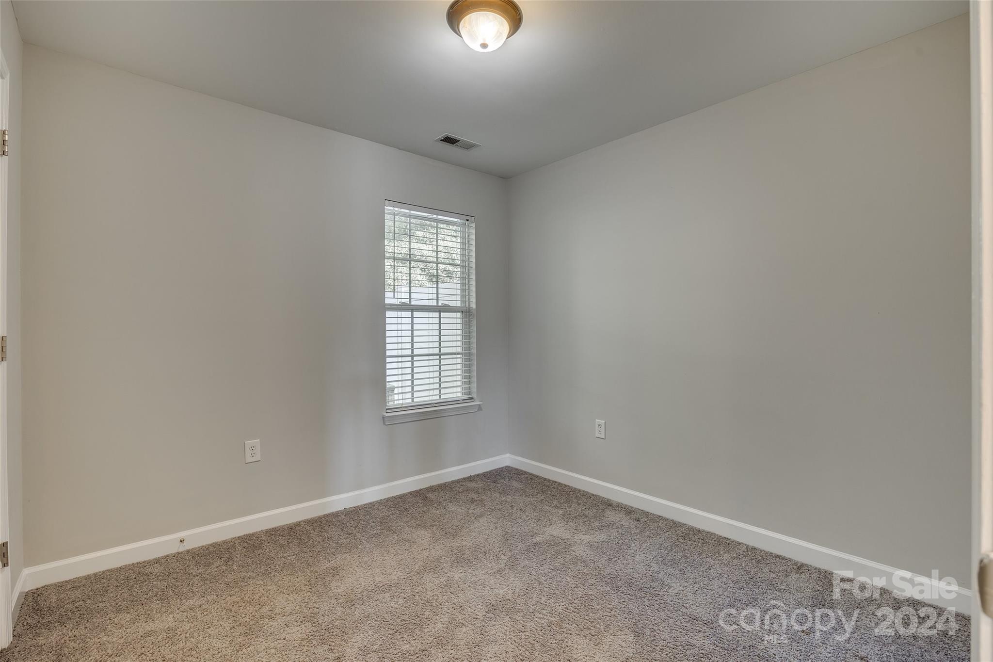 1446 Harpers Inlet Drive Clover, SC 29710 - Photo 12 of 28 an empty room with windows