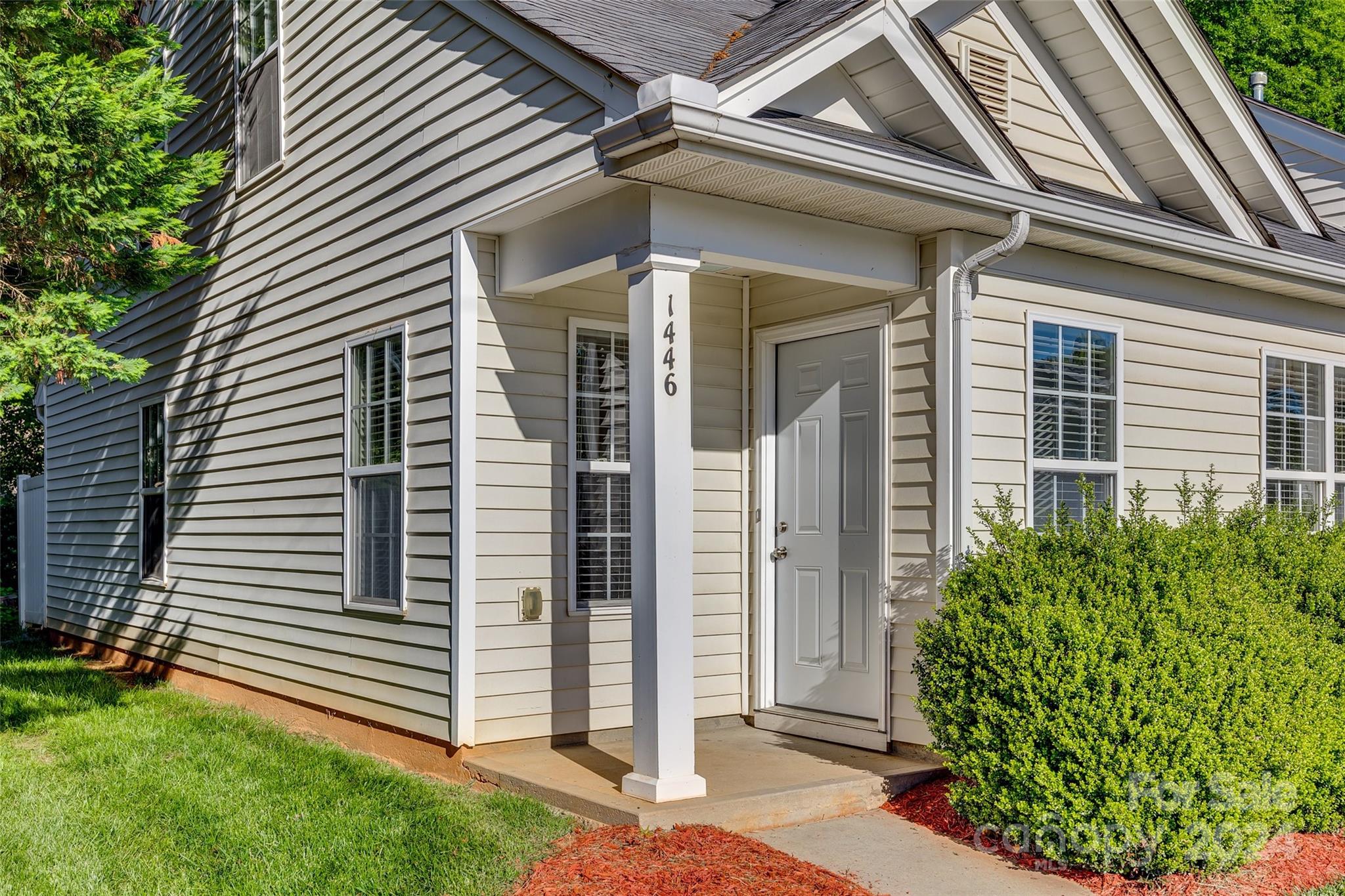 1446 Harpers Inlet Drive Clover, SC 29710 - Photo 2 of 28 a view of a porch with a door and a yard