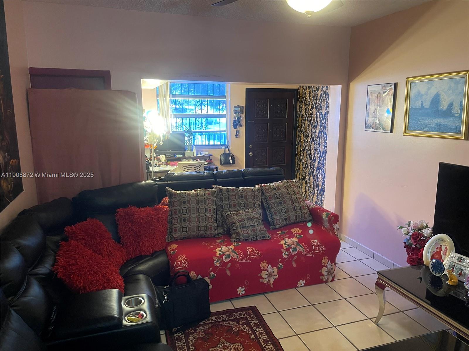 1832 Southwest 3rd Street Miami, FL 33135 - Photo 14 of 25 a living room with furniture and a window