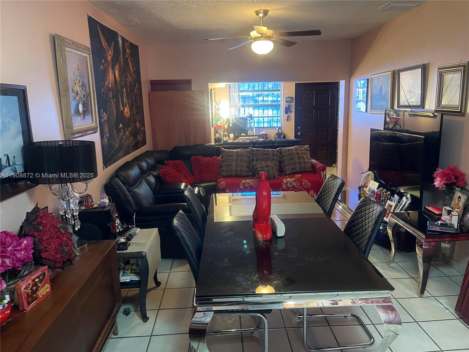 1832 Southwest 3rd Street Miami, FL 33135 - Photo 15 of 25 a living room with furniture and a flat screen tv