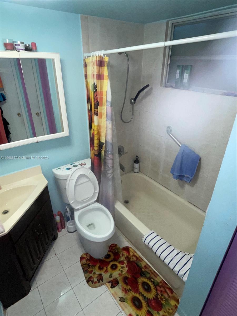 1832 Southwest 3rd Street Miami, FL 33135 - Photo 22 of 25 a bathroom with a sink toilet and shower