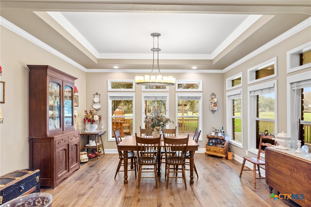 7134 Old Hwy Road Inez, TX 77968 - Photo 18 of 40 a view of a dining room with furniture window and wooden floor