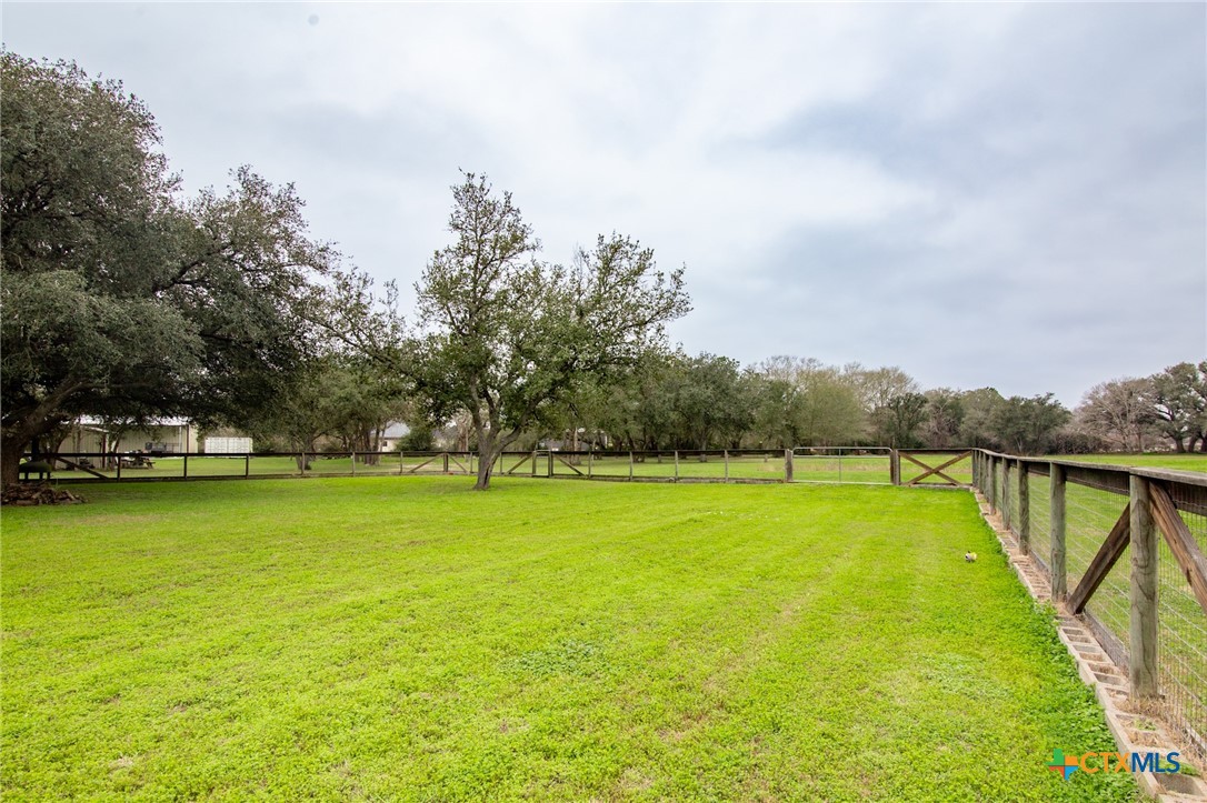 7134 Old Hwy Road Inez, TX 77968 - Photo 29 of 40 a view of swimming pool with a yard and large trees