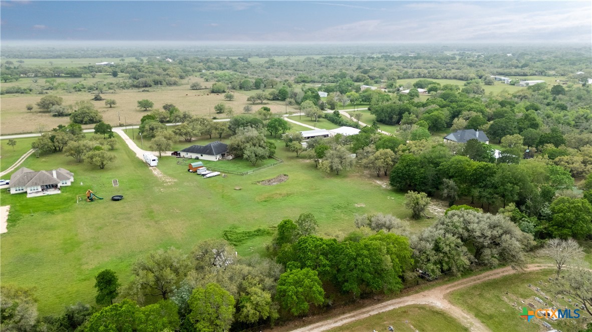 7134 Old Hwy Road Inez, TX 77968 - Photo 40 of 40 an aerial view of residential houses with outdoor space and trees